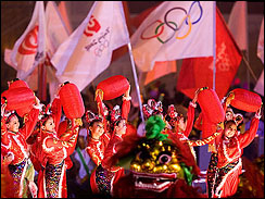 Chinese dancers perform during a ceremony to mark the one year countdown until the start of the 2008 Olympics at Tiananmen Square in Beijing, China, Wednesday, Aug. 8, 2007. (AP Photo/Andy Wong)
