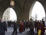 The Dalai Lama (centre) arrives under the Peace Tower on Parliament Hill, in Ottawa, Monday, October 29, 2007.