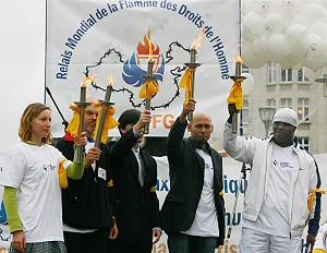 The Belgian Human Rights Torch Relay Ambassadors assemble on stage. (The Epoch Times)