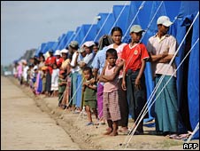 People line up at a government-run camp for the visit of UN chief Ban Ki-moon on 22 May 2008