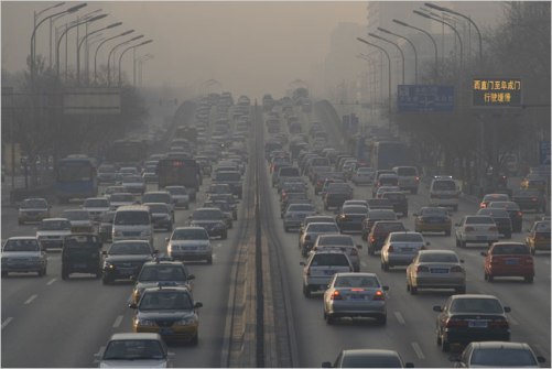 ADDED CARS, LOST HORIZONS The rush-hour haze in western Beijing one morning this month. An additional 1,200 cars and trucks roll into Beijing every day