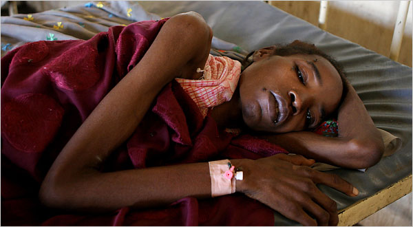 A girl in a camp for the internally displaced in Darfur is hospitalized. Child malnutrition is measured by using a ratio of weight versus height, as compared with the ratios for healthy children.